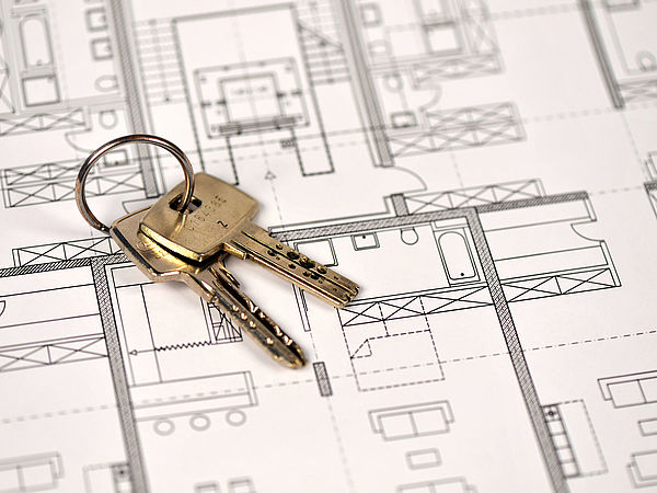 Schlüssel auf dem Grundriss einer Wohnung